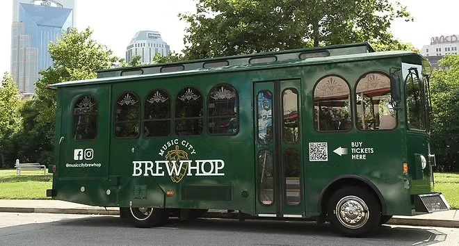 Music City Brew Hop vintage trolley parked at a Nashville brewery